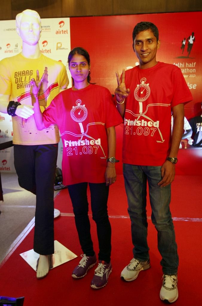 Indian defending champion Sudha Singh and Rahul Kumar launch the Licensed & Merchandised line of Airtel Delhi Half Marathon 2013 at Le Meridien in New Delhi on Thursday
